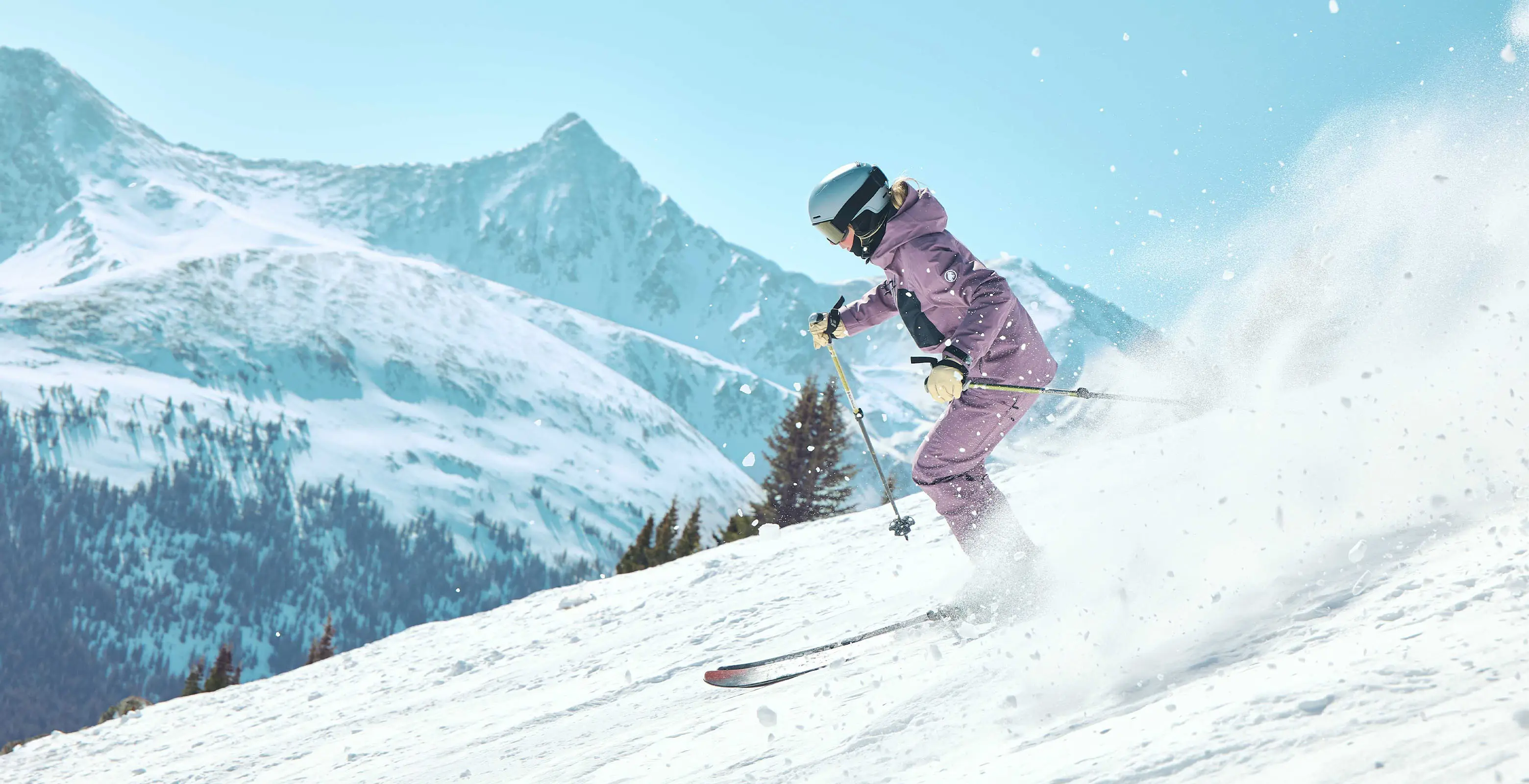 girl skiing fresh snow at copper